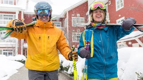 Skiers walking out of Clay Brook