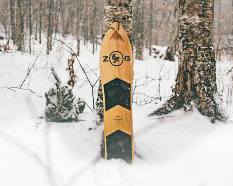 zero gravity branded burton throwback snowboard in the snow