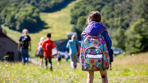 child with a backpack