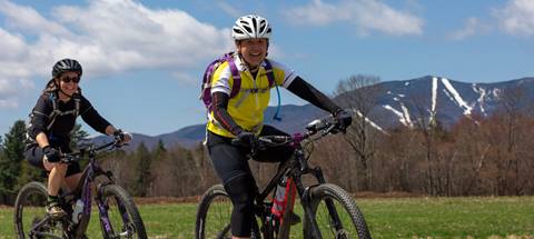 Mountain Bikers with Sugarbush in the background