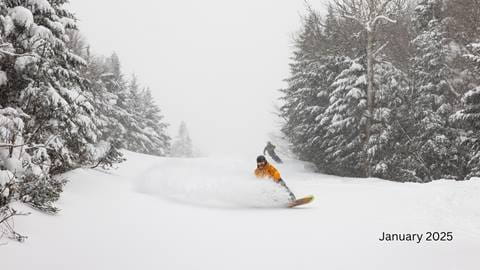 Man skiing in a red jacket