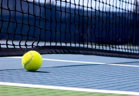 Tennis ball on a court