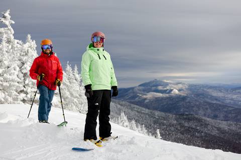 Skier and Snowboarder with a view