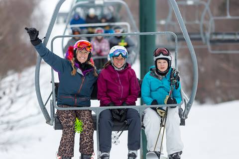 Women Smiles on Chairlift