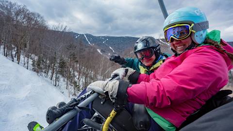 Adaptive skiers enjoying resort skiing accessibility at sugarbush